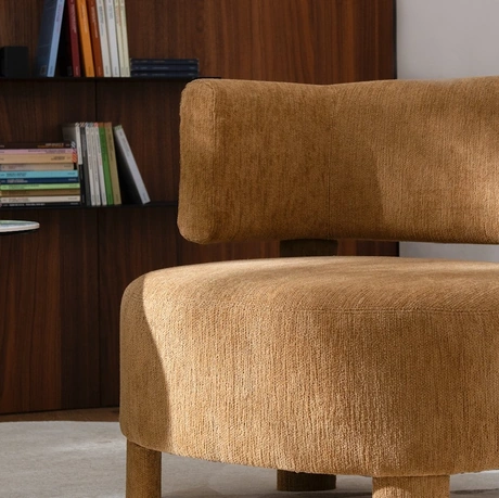 Poltroncina rivestita in tessuto Glen Soft di Calligaris